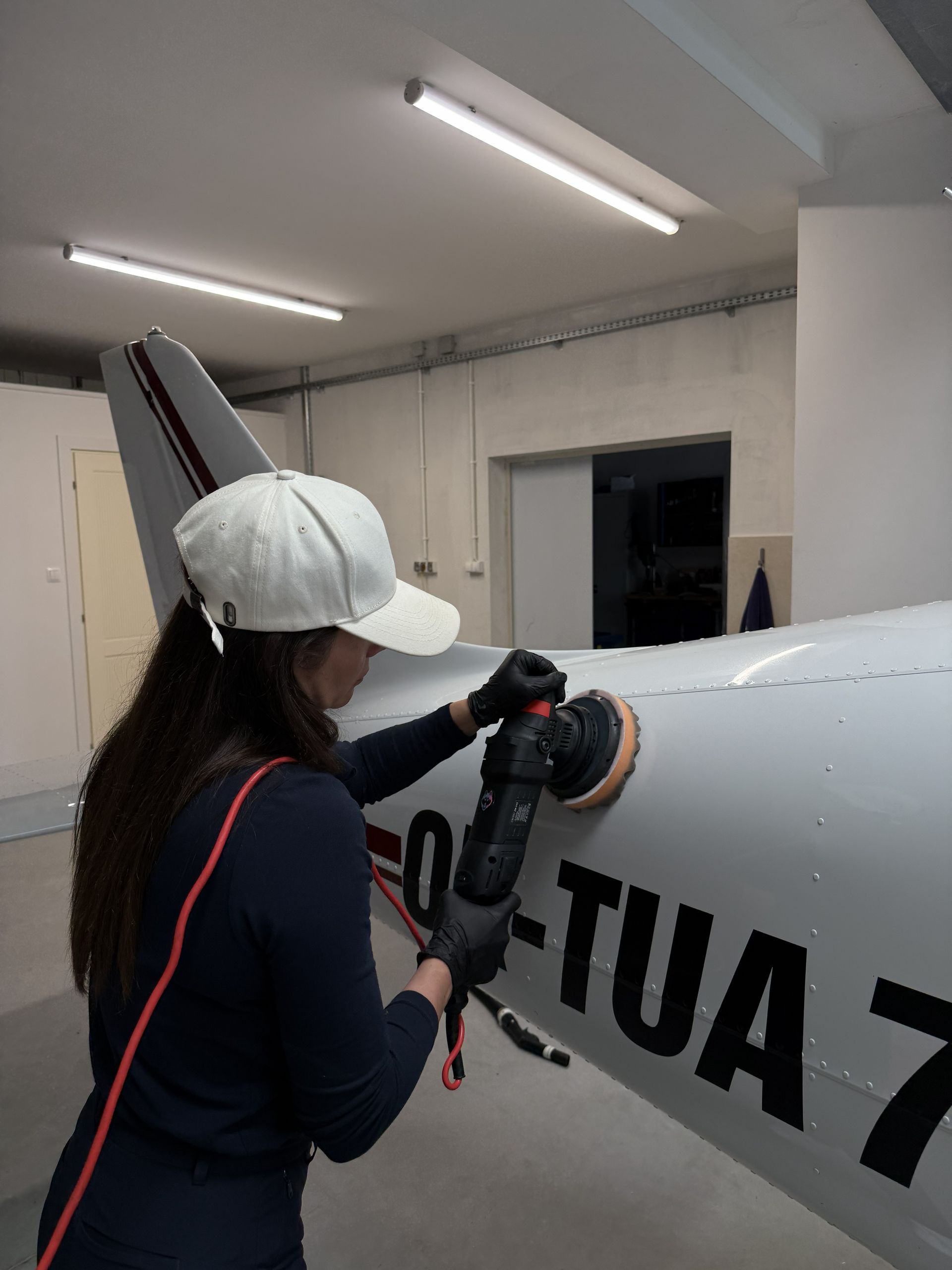 Private jet wing and engine nacelle detailing — precision surface treatment